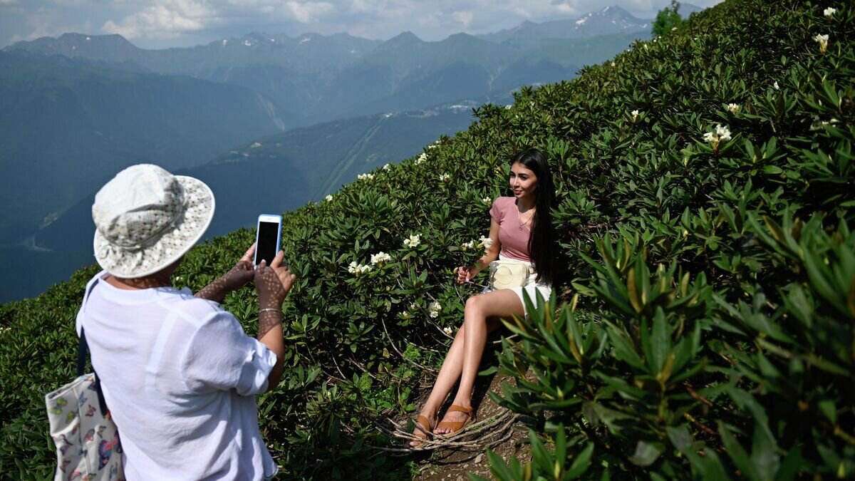    Отдыхающие на горном курорте Красная Поляна© РИА Новости / Артур Лебедев