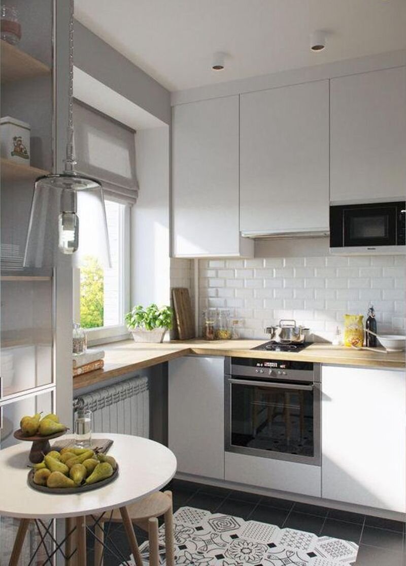 Удачный дизайн небольшой угловой кухни.