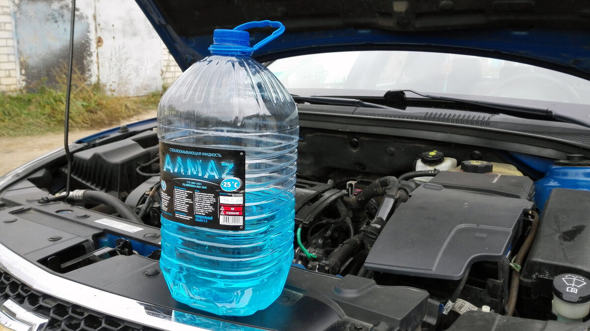 Куда заливать незамерзайку в bmw