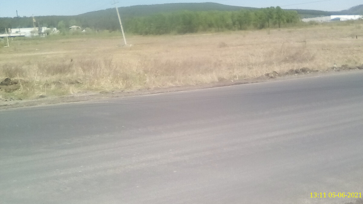 Фото автора. Раньше тут почти не было асфальта, были одни ямы. Это был самый  разбитый отрезок дороги.