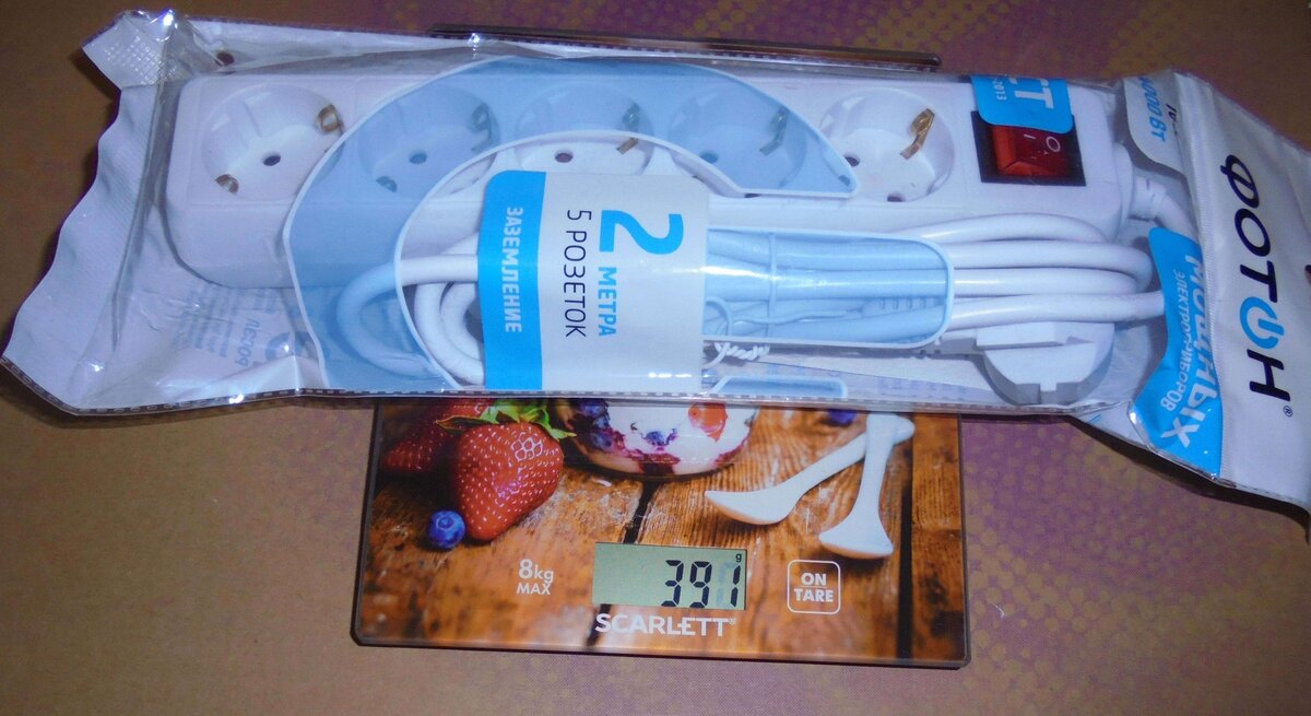 Измеренная масса девайса вместе с упаковкой составила 391 грамм —>