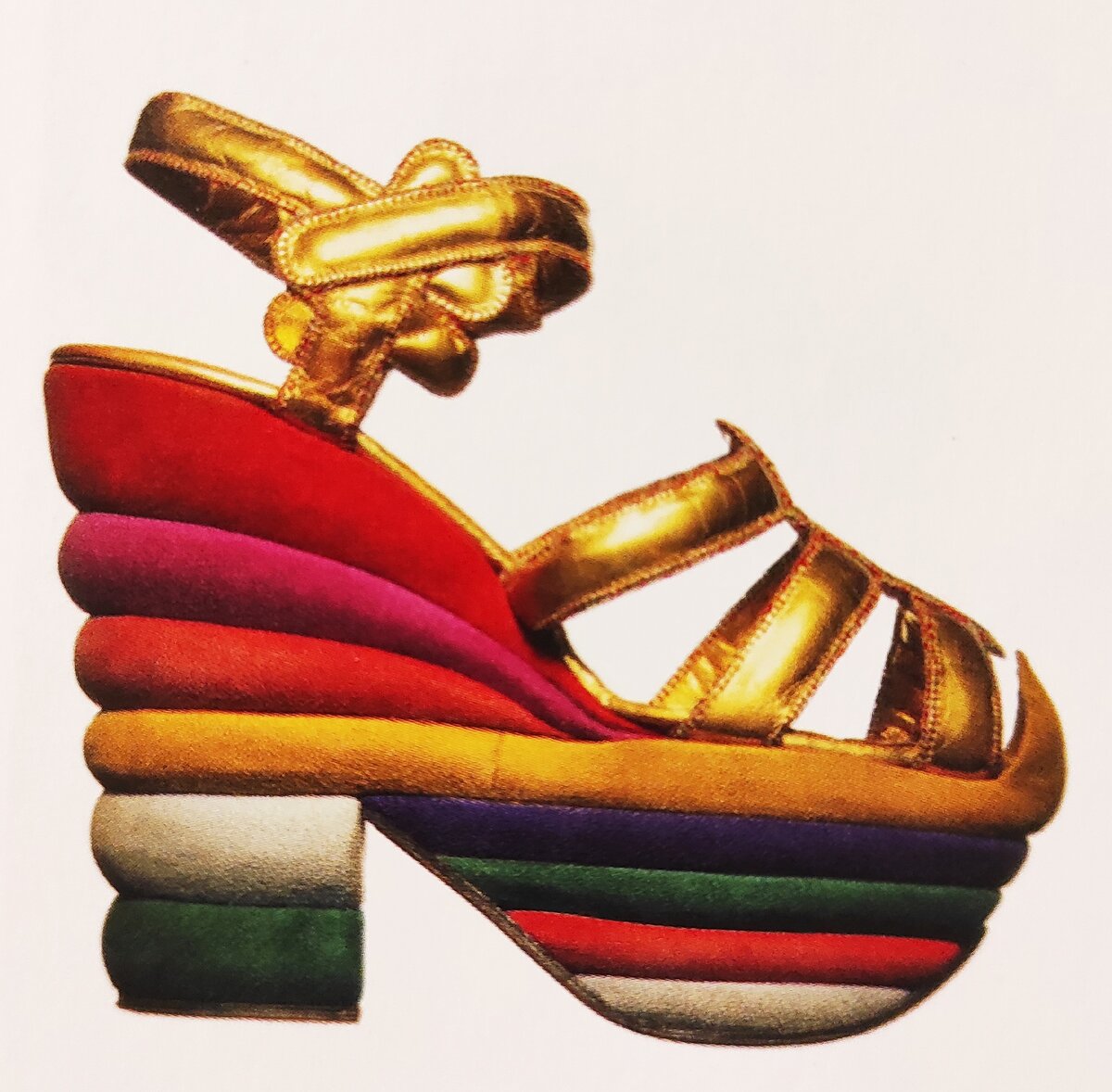 Туфли на платформе из золотой лайки и разноцветной замши от Salvatore Ferragamo. Модель разработана для американской актрисы Джуди Гарланд в 1938 г.