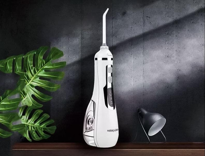 Компактный ирригатор для эффективной чистки полости рта - для сияющей улыбки!