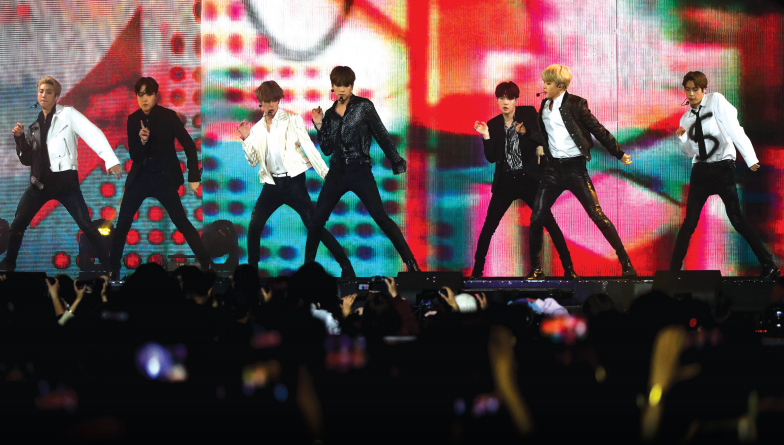 BTS открыла новую главу в истории K-поп. В августе 2020 года после выпуска своего нового цифрового сингла «Dynamite», группа возглавляла чарт «Hot 100» журнала «Billboard» в течение первых двух недель.