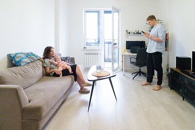    Семья в новой квартире ©Д. Гришкина Пресс-служба мэра и правительства Москвы