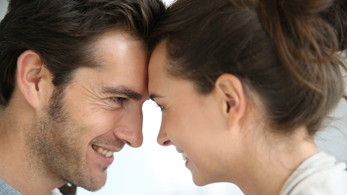 Profile of loving couple looking at each other