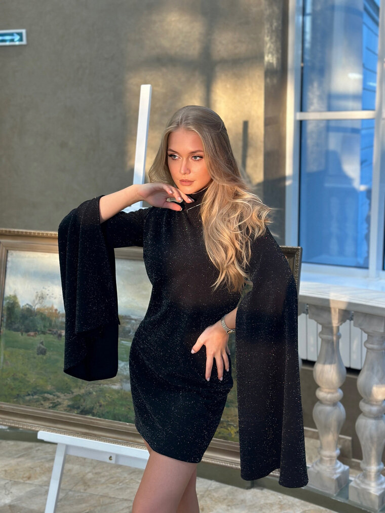    На первую фотосессию Наталья надела платье