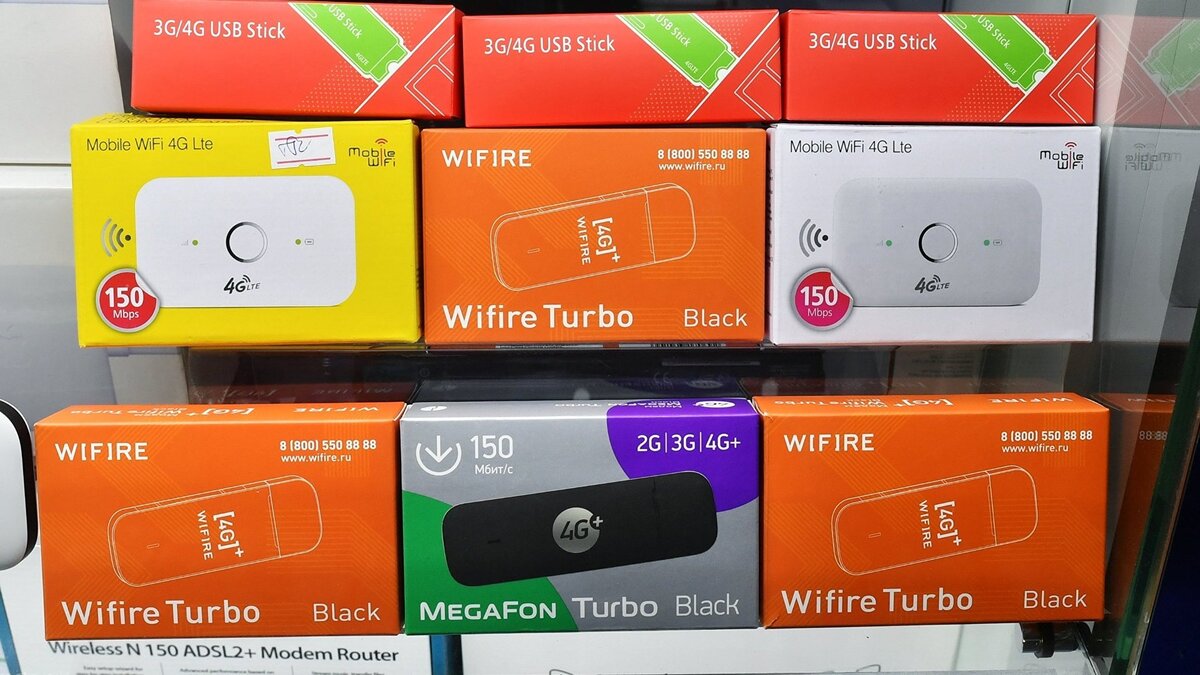    Wi-Fi роутеры на полке магазина© РИА Новости . Михаил Воскресенский