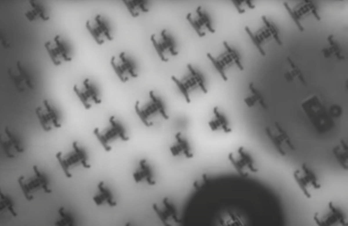 Нано роботы под микроскопом