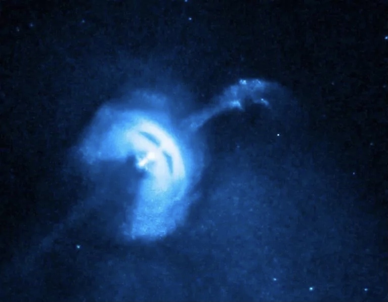 Это изображение Пульсар в Парусах, полученное с помощью рентгеновской обсерватории "Чандра". Струя обусловлена быстро движущимися частицами, порожденными нейтронной звездой.