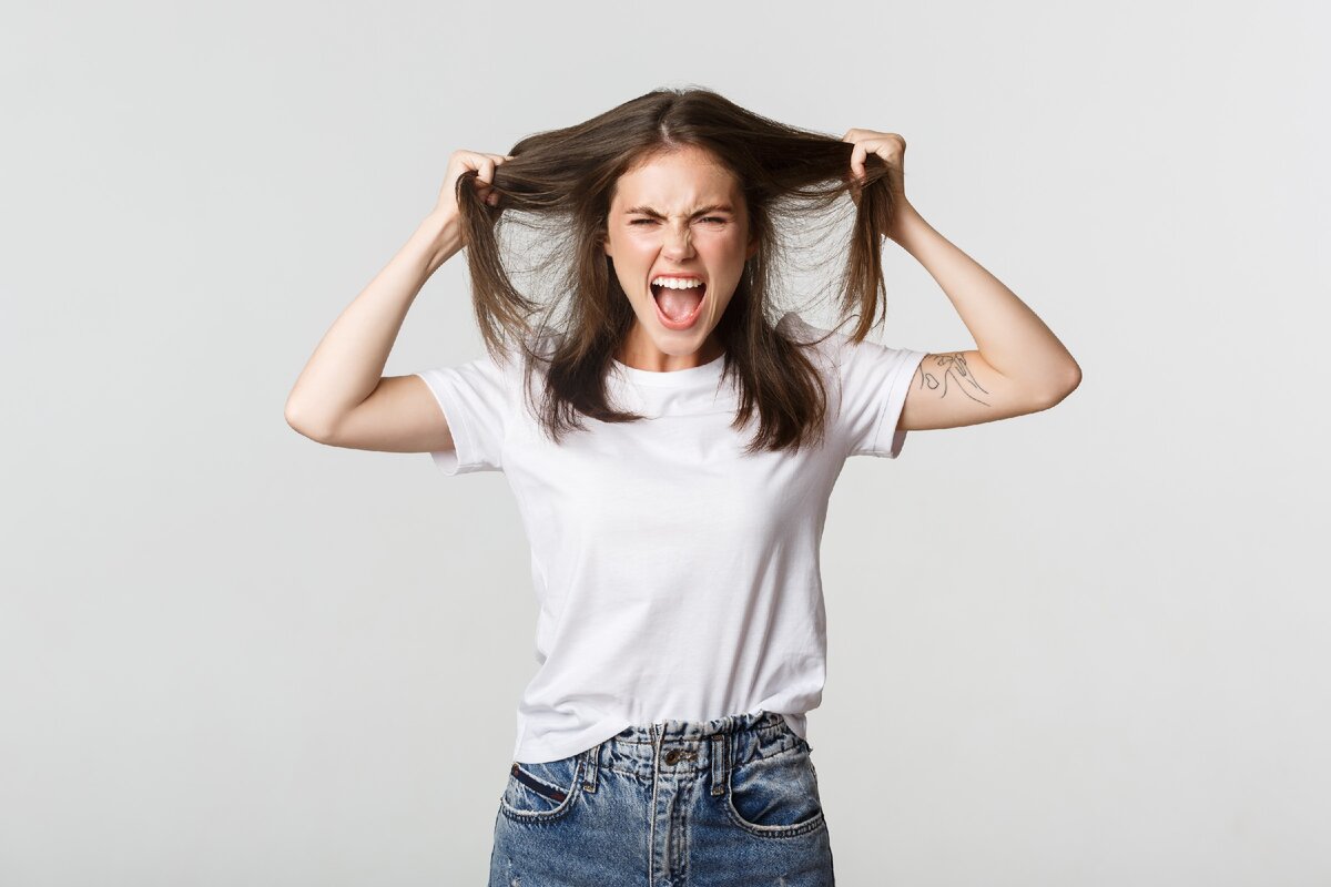 Причины трихотилломании.