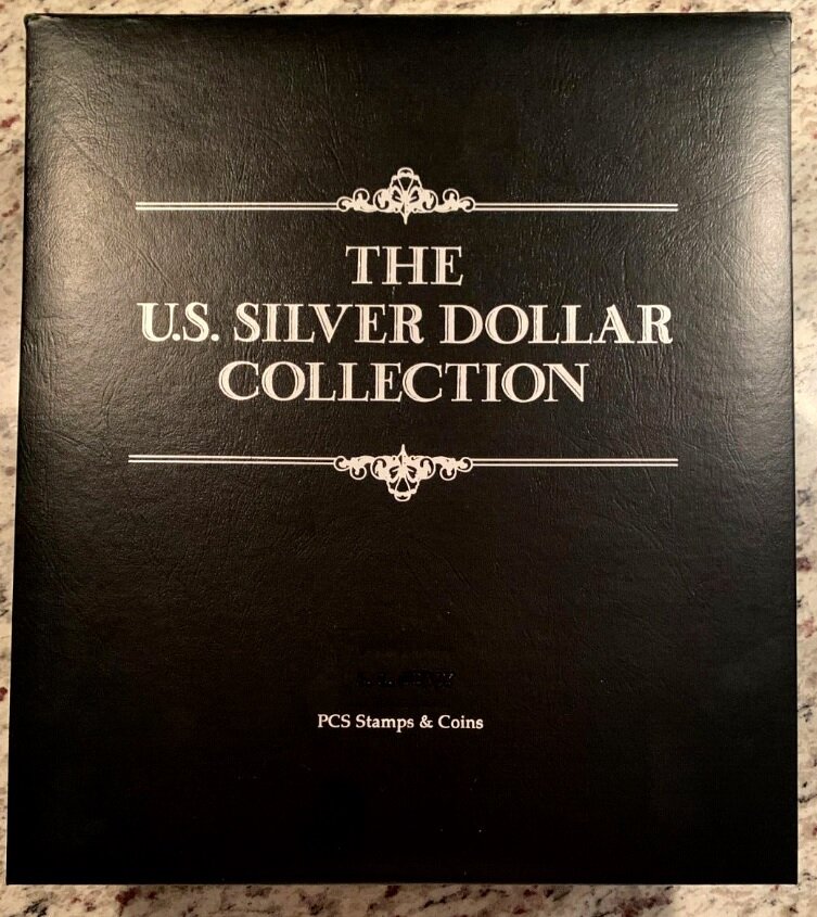 Альбом серебряных долларов