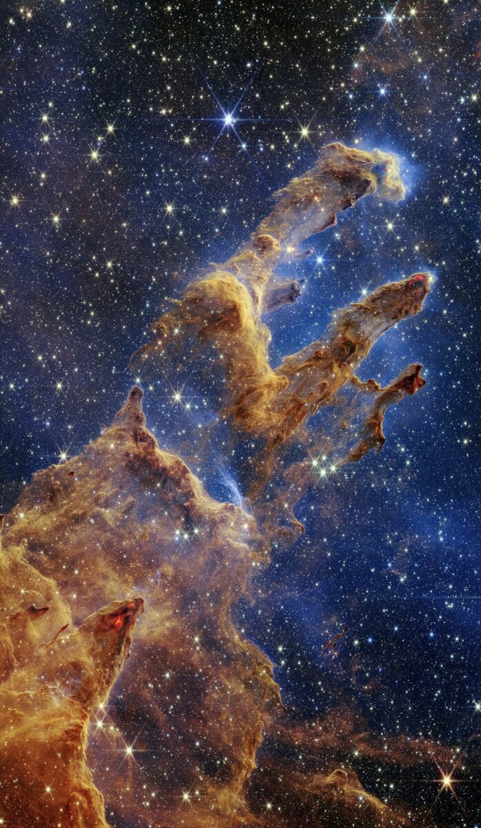 Новое изображение JWST показывает множество вновь сформированных и все еще образующихся звезд, которых никогда раньше не видели. Эти звезды лепят столбы с их интенсивным излучением.(Изображение предоставлено: NASA, ESA, CSA, STScI; Джозеф Де Паскуале (STScI), Антон М. Кёкемор (STScI), Алисса Паган (STScI).)