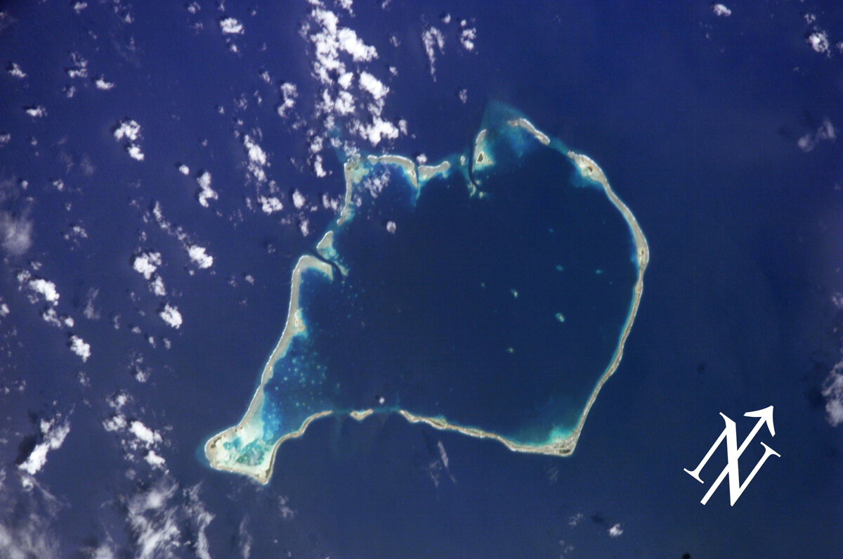 Атолл Фунафути - столица. Автор: NASA, bearbeitet HT - File:Funafuti.jpg, Общественное достояние, https://commons.wikimedia.org/w/index.php?curid=88273897
