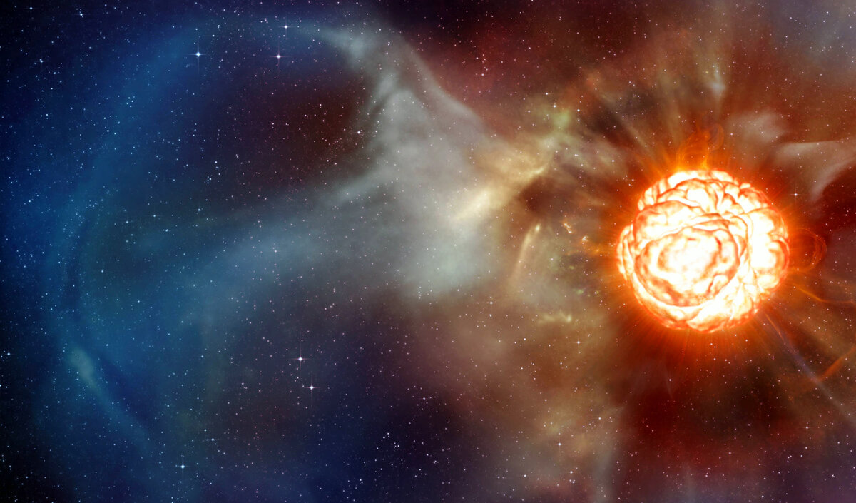 Изображение этого художника показывает сверхгигантскую звезду Бетельгейзе, которая может стать сверхновой. На нём показано, что у звезды есть огромный газовый шлейф размером почти с нашу Солнечную систему и гигантские пузыри, кипящие на её поверхности. Фото: ESO/L. Calçada