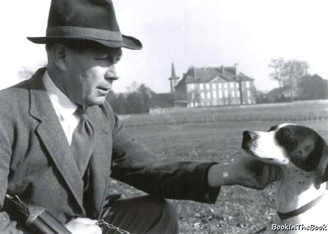 Жорж Де Местраль со своей собачкой