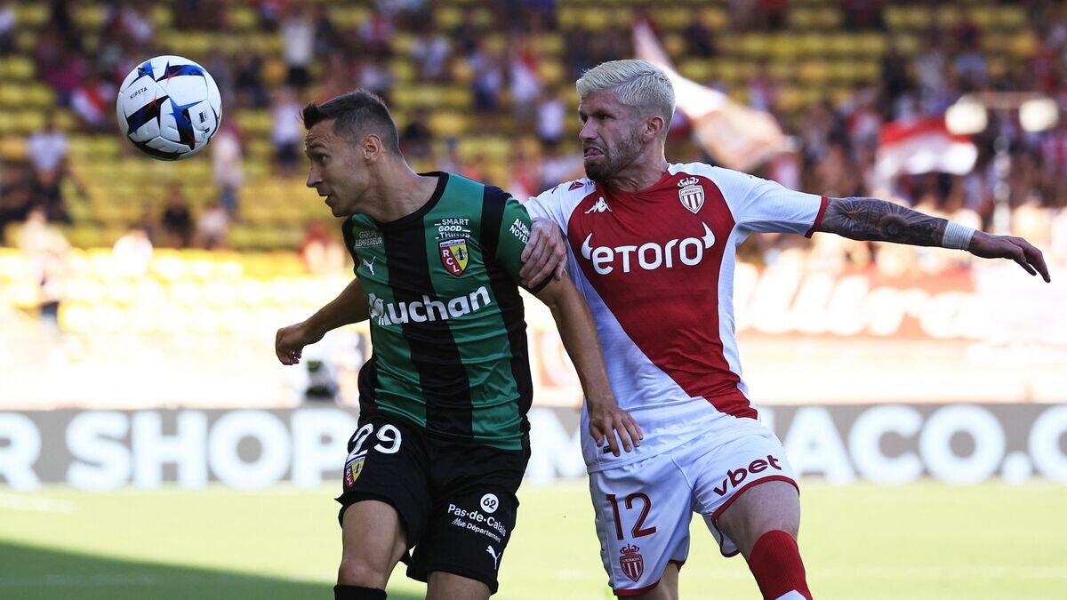    Пшемыслав Франковский (слева) и Кайо Энрике© AFP 2022 / VALERY HACHE