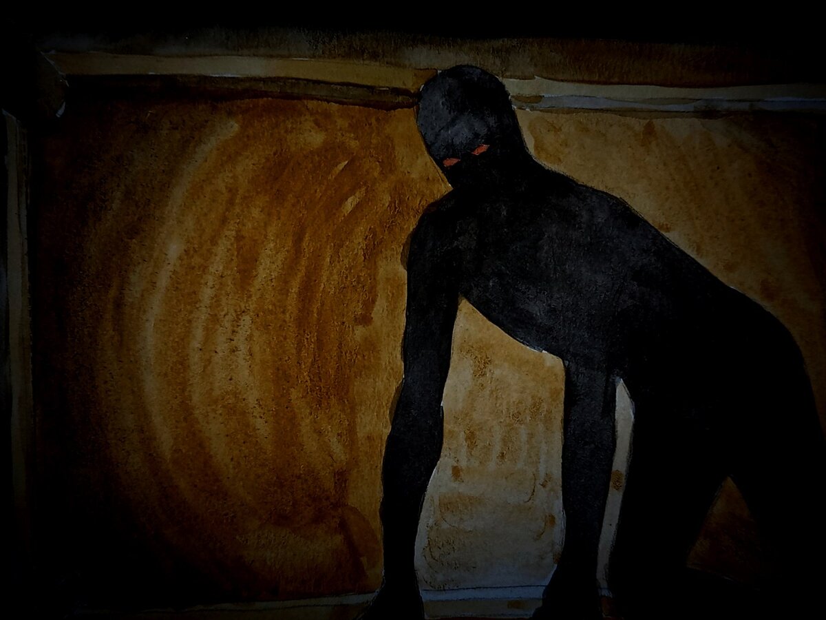 Чёрный монстр с красными глазами.