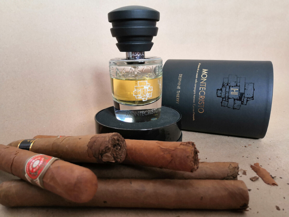 Фото: Личная коллекция Aromoteca.ru / Парфюмерный Диалог                                            Великолепная композиция аромата "Montecristo" Masque Milano                                  Верхние ноты	Амбретта, Ром, Кабреува                                                                          Ноты базы:       Стиракс, Даман, Гуаяк, Белый кедр, Пачули
Ноты сердца:  Табак, Смена сельдерея, Лабданум, Бензоин