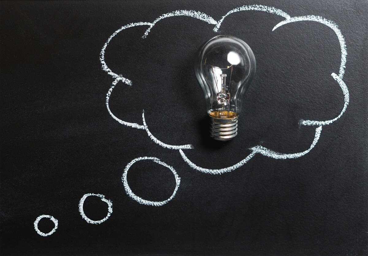 https://www.pexels.com/photo/clear-light-bulb-on-black-surface-356043/
