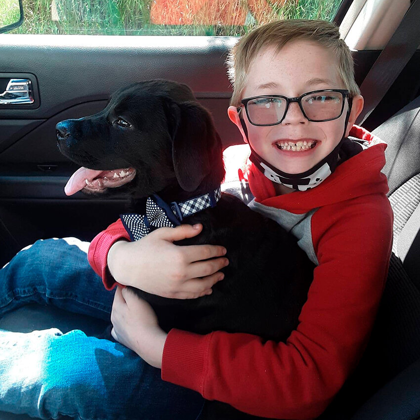 Брайсон и его щенок Брюс / Фото: Kimberly Woodruff