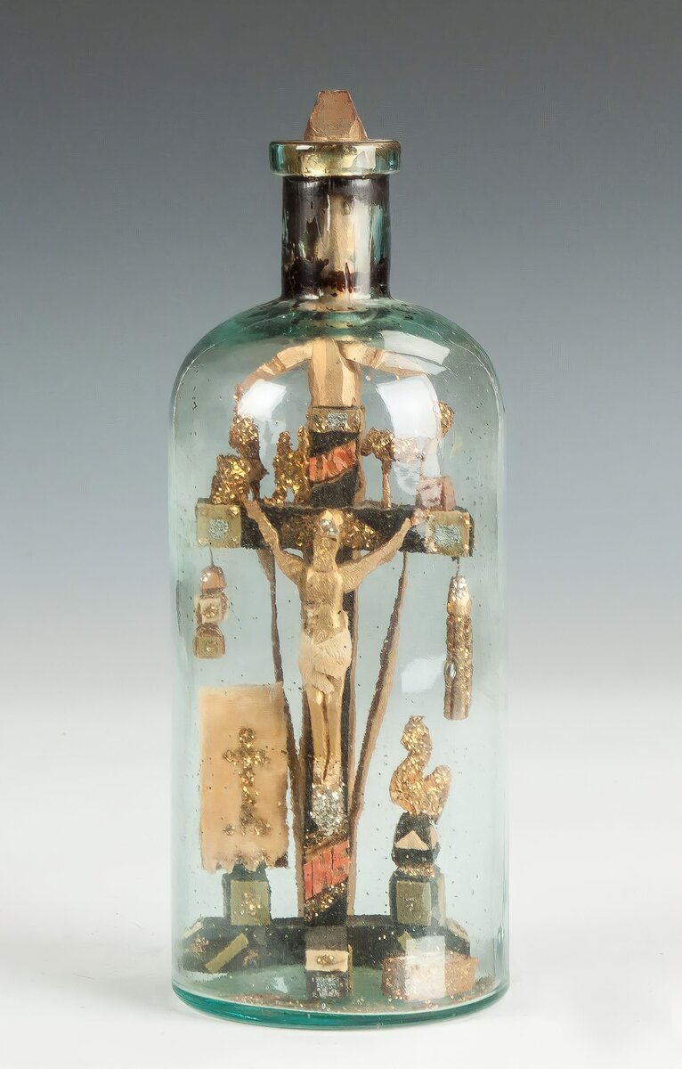 https://www.cottoneauctions.com/lots/31078/carved-crucifix-in-a-bottle