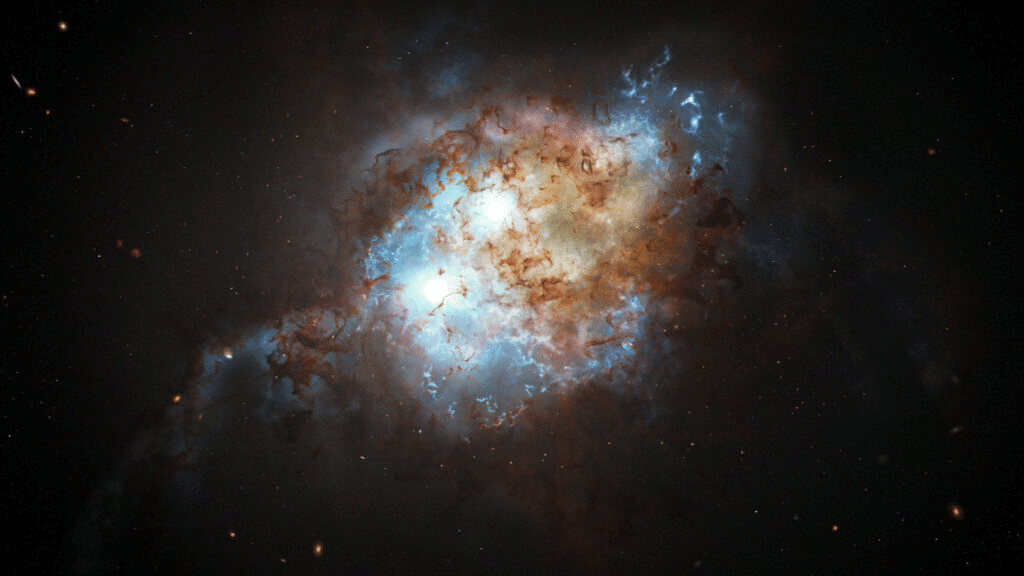    Двойной квазар, изображение художника / ©NASA, ESA, Joseph Olmsted (STScI)