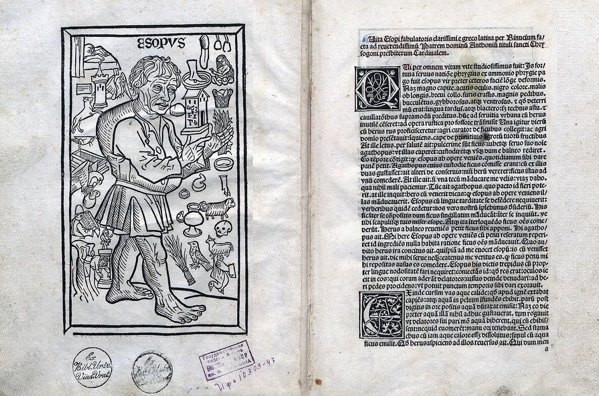 Страницы древней книги с баснями Эзопа.