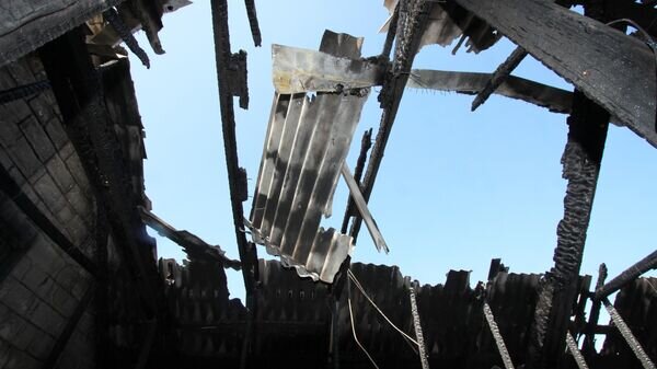    Последствия обстрела в Горловке© РИА Новости / Сергей Аверин