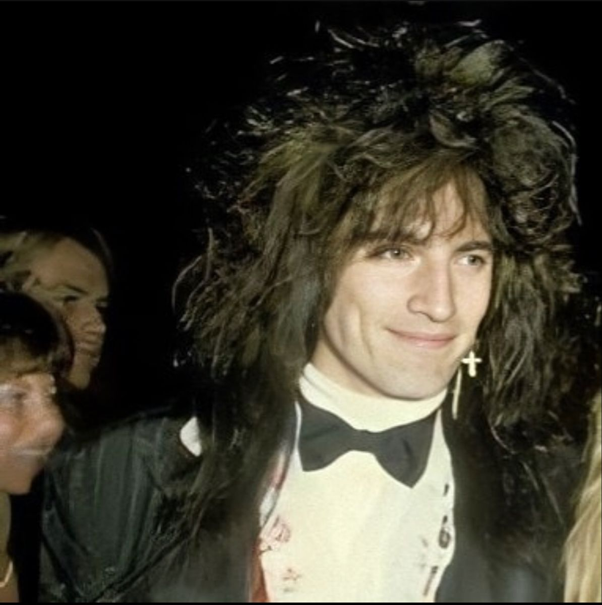 Это не Дмитрий Маликов, это Томми Ли в молодости. 