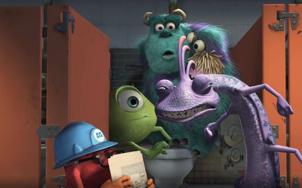 Скрин из мультфильма «Корпорация Монстров». Герои мультика в декорациях американского общественного туалета
