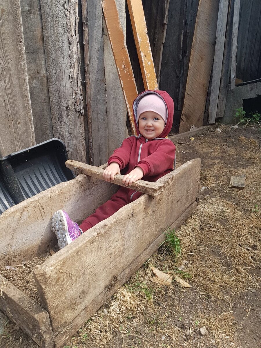 В деревне. Наверное думает, что в лодке.