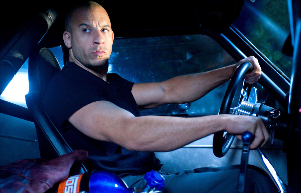 https://images.hdqwalls.com/download/vin-diesel-in-fast-and-furious-hd-1400x900.jpg