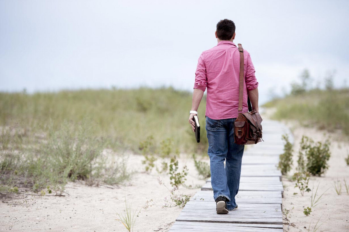 A man Walking to right