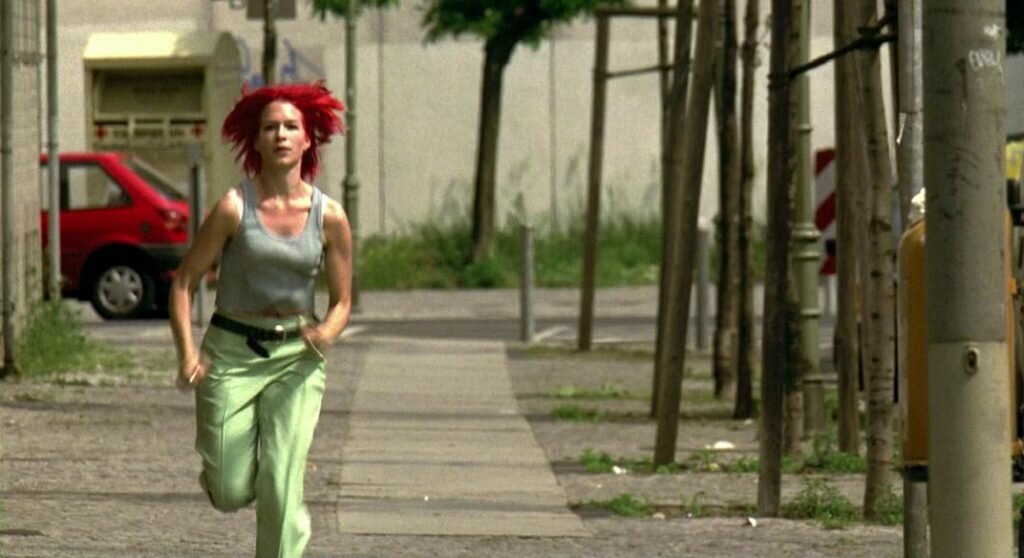 Run lola run. Франка Потенте беги Лола. Беги Лола беги фильм 1998. Беги Лола беги актриса. Кадр из фильма беги Лола беги.