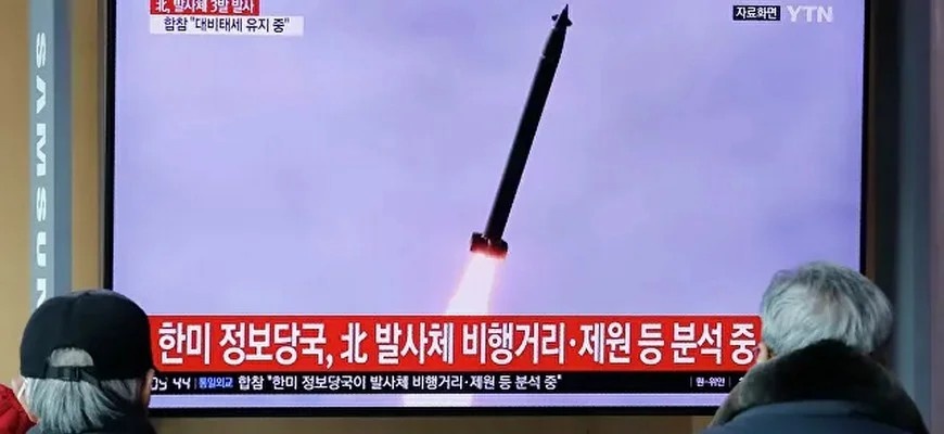 Демонстрация запуска ракеты в КНДР, © Ahn Young-joon / AP Photo