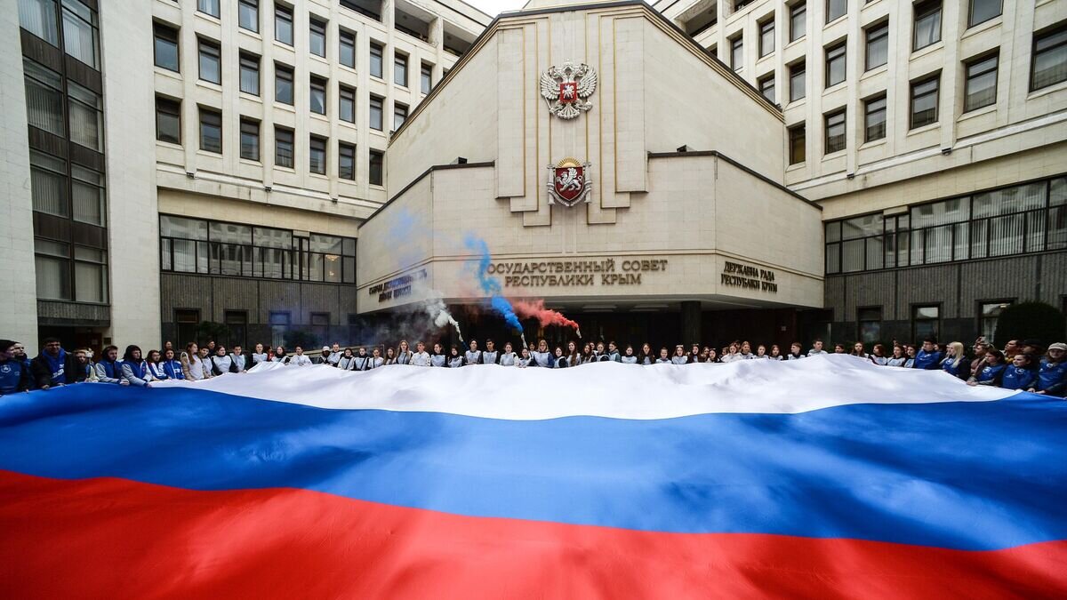    Молодежная акция, посвящённая Дню воссоединения Крыма с Россией© РИА Новости / Константин Михальчевский