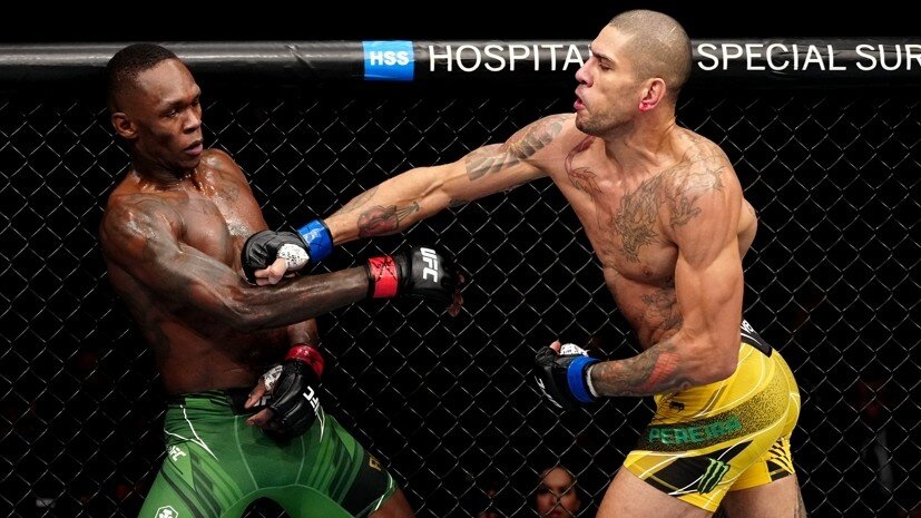     Бойцы UFC Исраэль Адесанья и Алекс Перейра Gettyimages.ru Jeff Bottari / Contributor