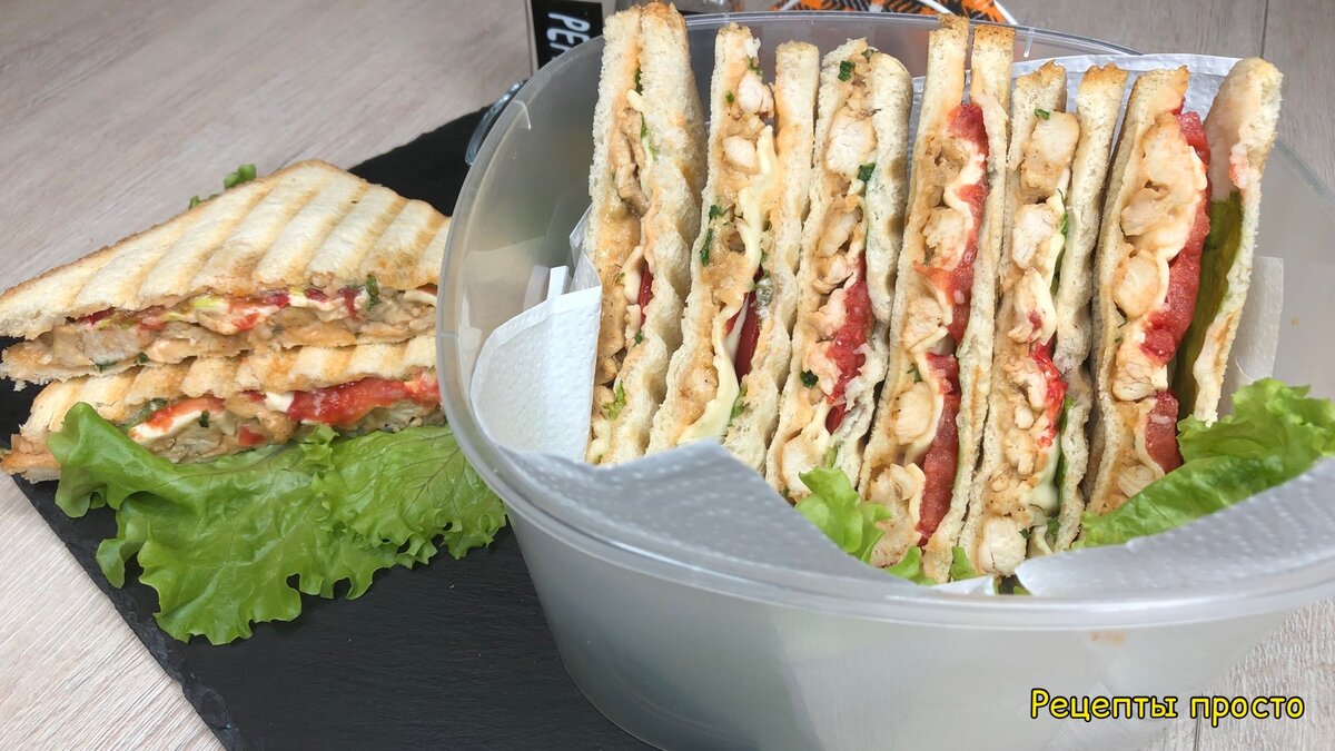 Приготовила сэндвичи с курицей, сыром помидорами.