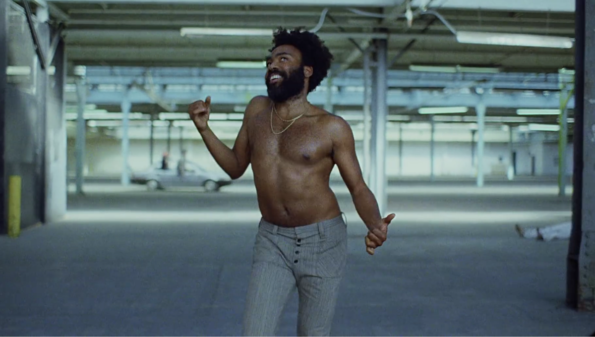 Клип где мужчина. Дональд Гловер this is America. Чайлдиш Гамбино this is America. Дональд Гловер клип. Гамбино ЗИС ИС Америка.