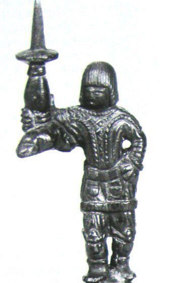 Варвар, одетый и постриженный по моде V-VI веков. Деталь византийского подсвечника. 