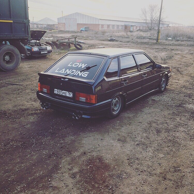 Сзади