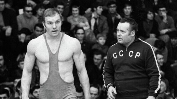    Чемпион Олимпийских игр, чемпион мира и СССР по вольной борьбе заслуженный мастер спорта Иван Ярыгин выходит на борцовский ковер.© РИА Новости / Игорь Уткин