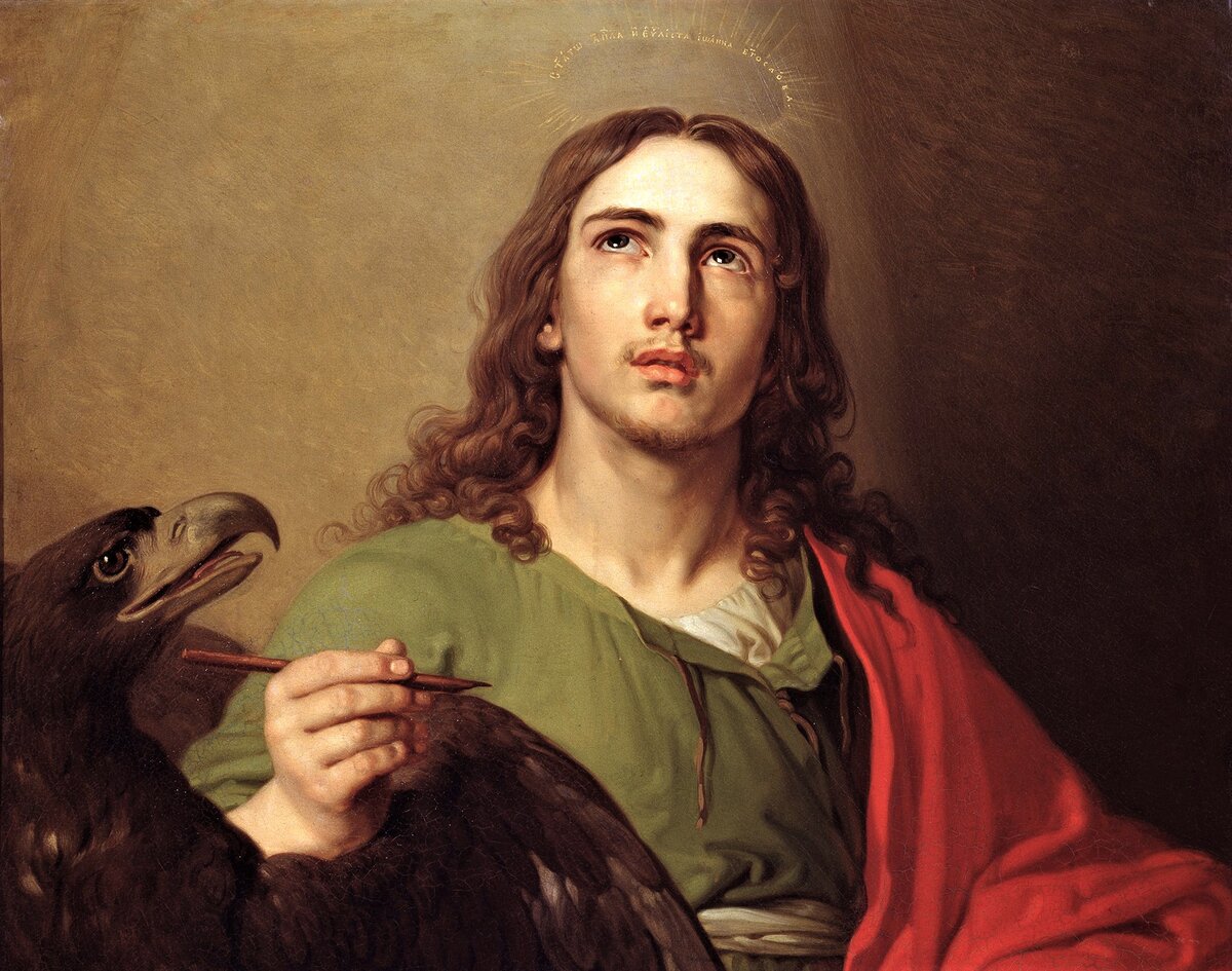 Апостол Иоанн. Его символом является орел за высотку богословия.