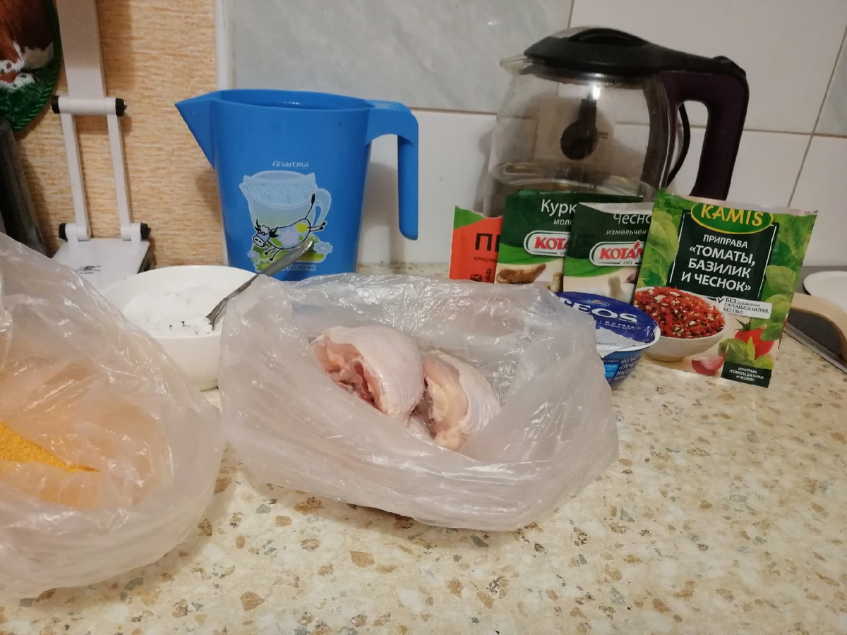 Куриные части(какие любите) - сложить в пакет, во второй насыпать панировочные сухари.