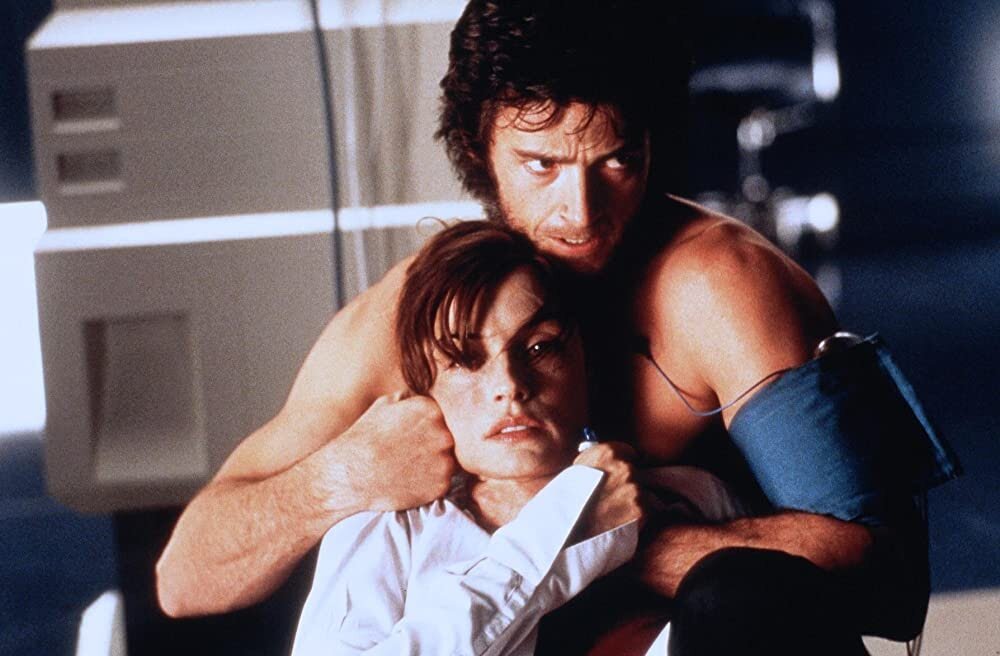 Фамке Янссен и Хью Джекман в фильме «Люди Икс» (2000)