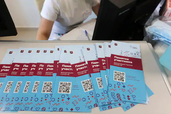 Leaflets on Russia’s Sputnik V vaccine at Moscow city clinic No. 68 on Dec. 5. (Andrey Rudakov/Bloomberg News) 