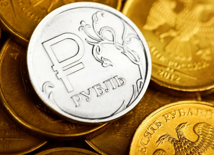 Символ современного российского рубля на монете