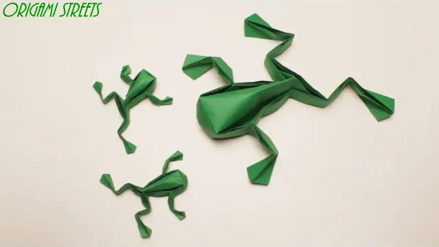 Игрушка оригами лягушка. Оригами лягушка прыгающая. Оригами лягушка прыгающая. Оригами коробочка лягушка. Оригами лягушка.
