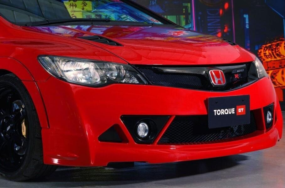 Honda Civic Mugen RR дебютировал в 2007 году. Весь тираж ограниченной серии, состоял из 300 экземпляров и был распродан в Японии за десять минут.-2-2